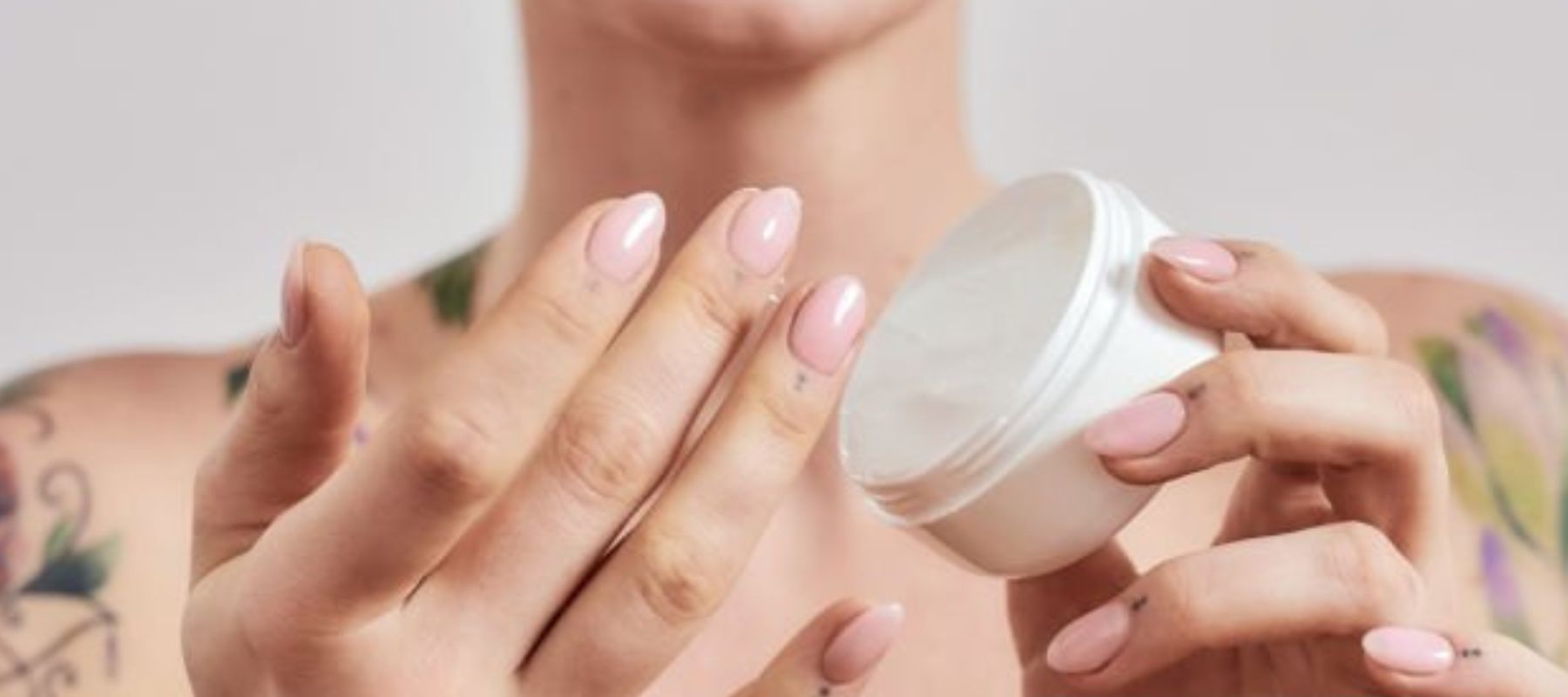 woman using numbing cream