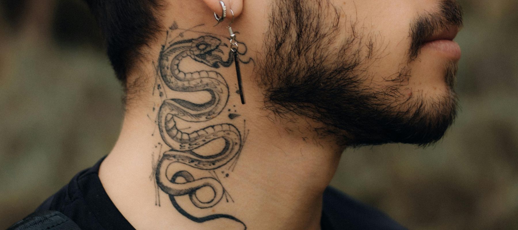 What do snake tattoos symbolise